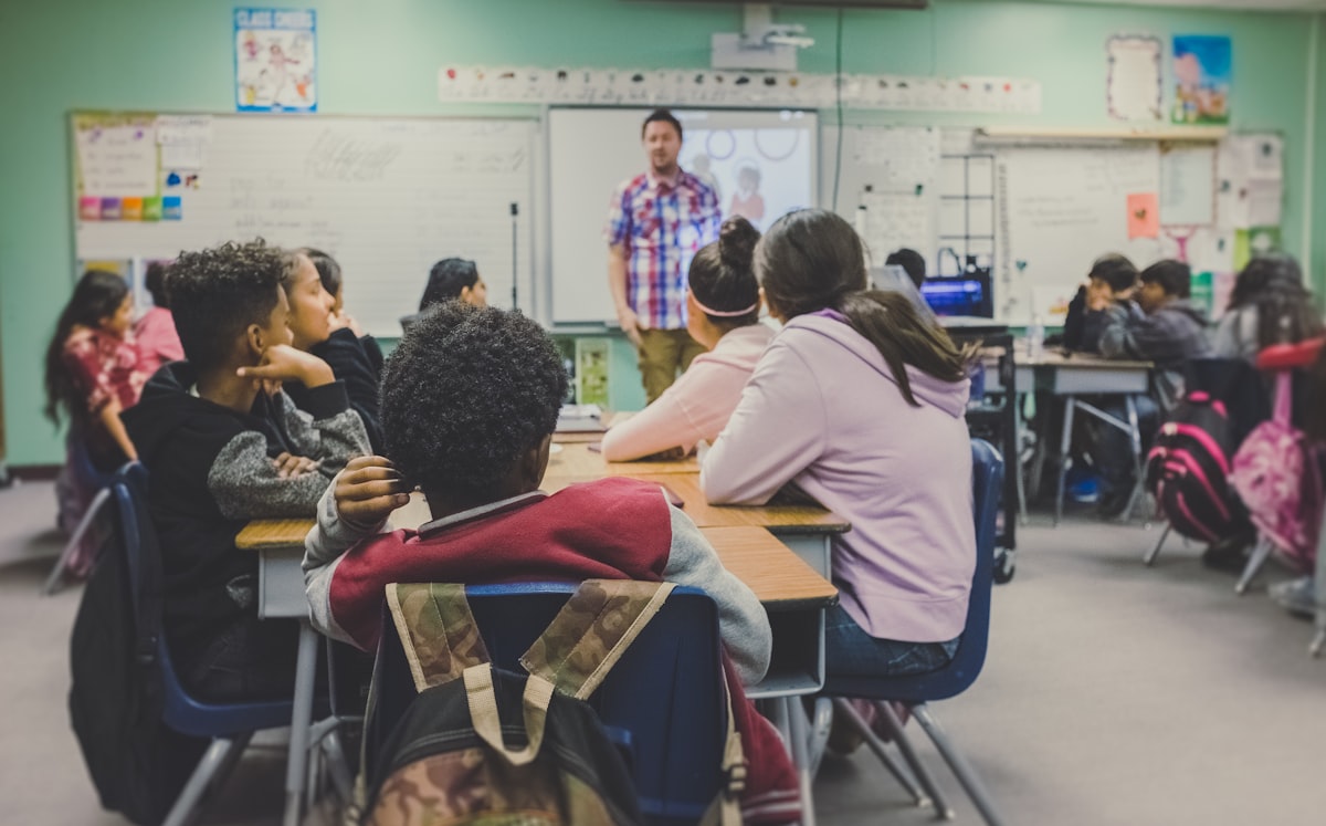 Teacher with students